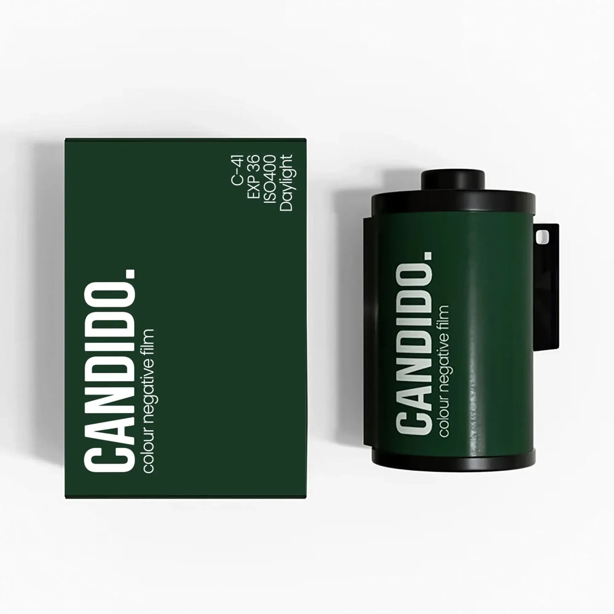 Dark green candido color negative film canister with black plastic end caps and white branding.