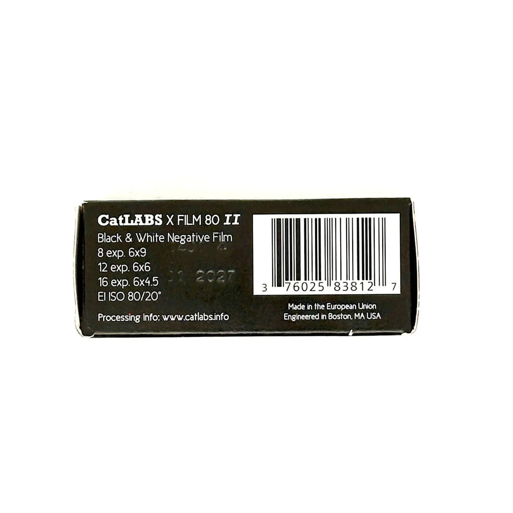 Black rectangular box for catlabs x film 80 ii black & white negative film, featuring a barcode and product specifications printed in white text.