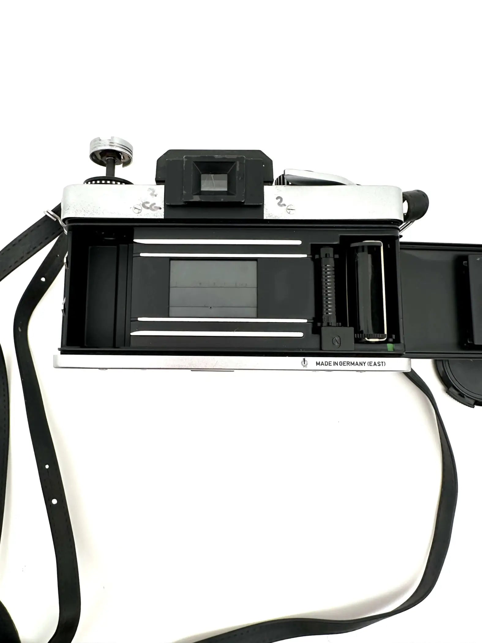 Silver and black rangefinder camera with a classic, retro design.