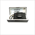Black olympus camera with a sleek, compact design and glossy finish.