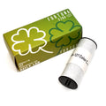 Green cardboard box with white shamrock design containing reflx lab fortuna c200 color negative film roll in silver cylinder
