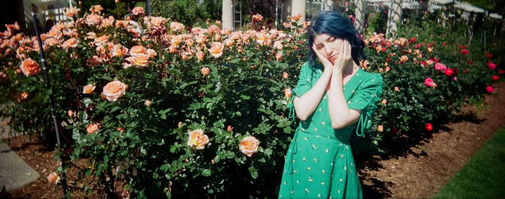 Green dress with small white floral pattern